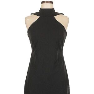 Bebe, Mock neck strappy crepe dress. Size 14
In very good condition!